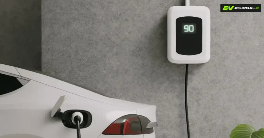 Wall-mounted EV charger connected to an electric car in a home parking area