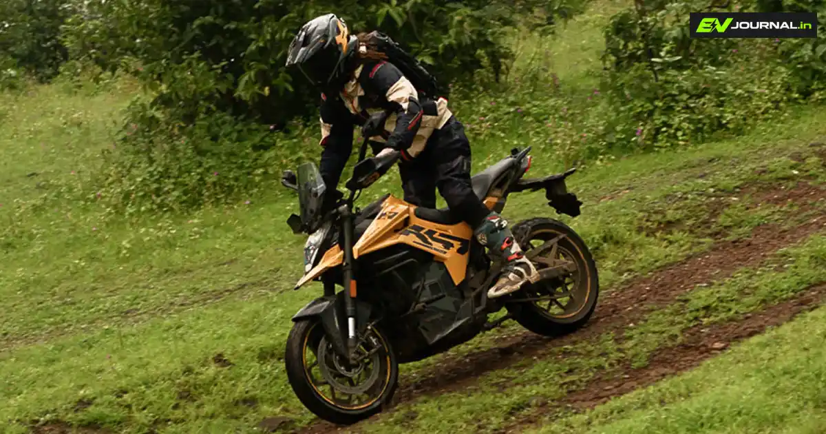 Ultraviolette X-47 Venom electric motorcycle being ridden on an off-road trail